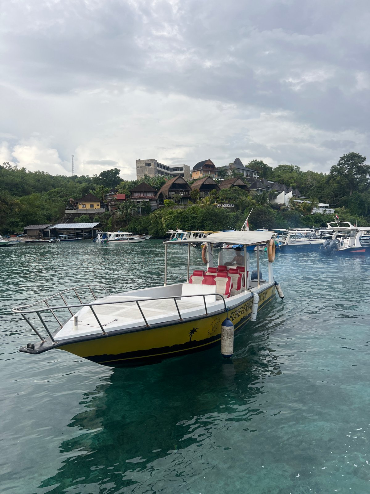 Evening harbor scene captured in Nusa Penida, Indonesia