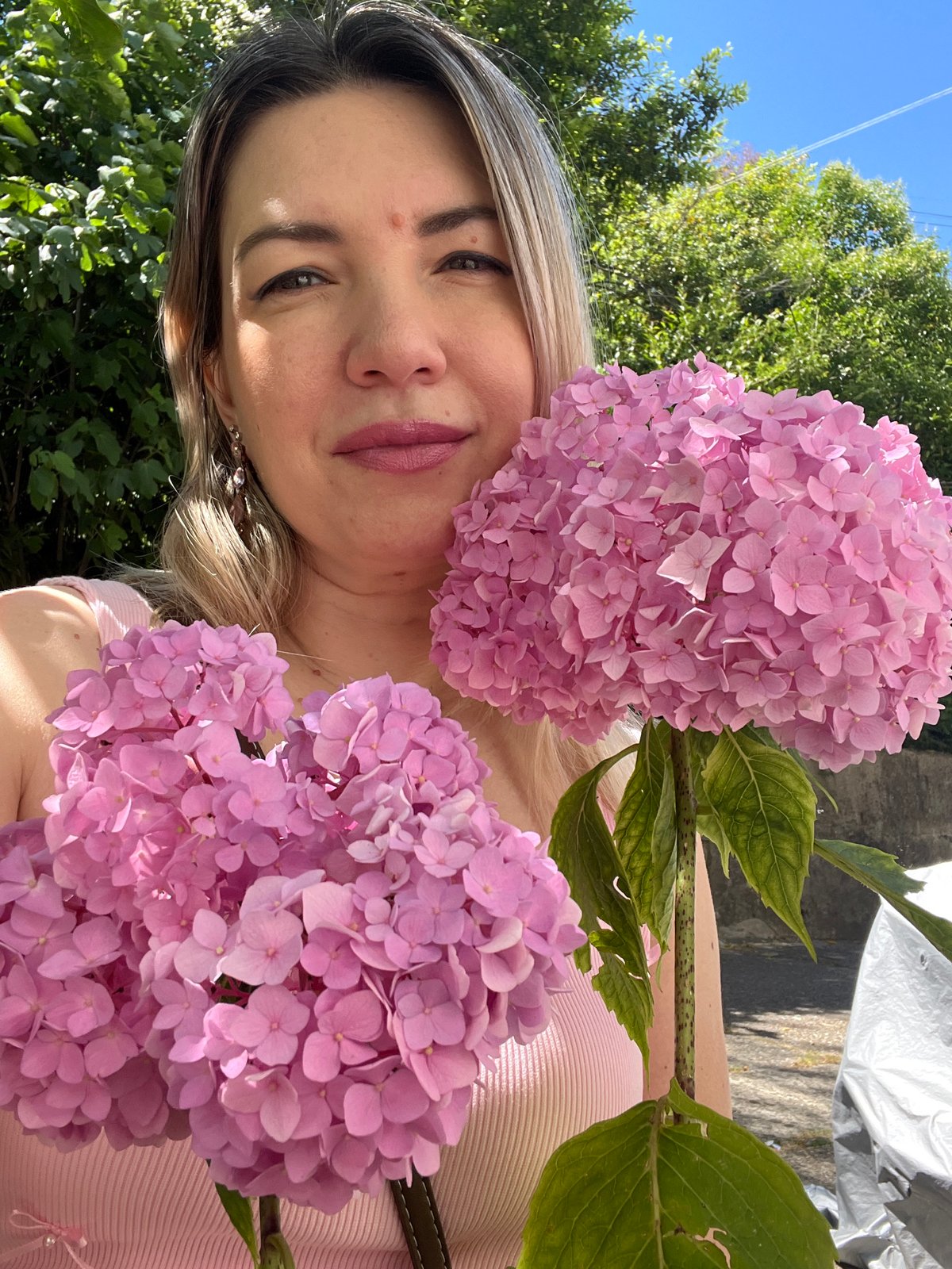 Lazy summer day in Sochi — flowers, food stalls, and a fluffy dog