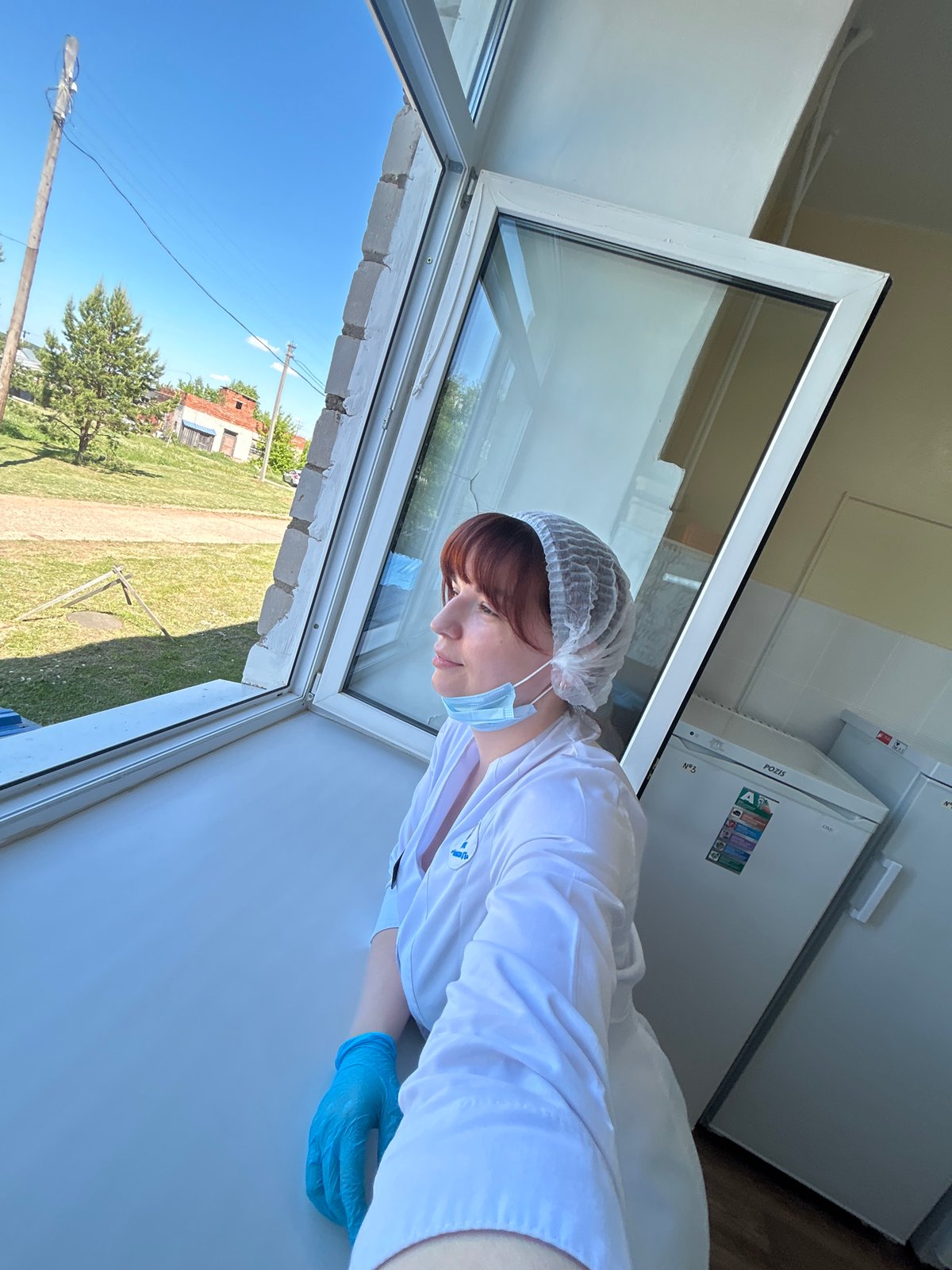 Healthcare worker documents workday in Фоки, Russia medical facility