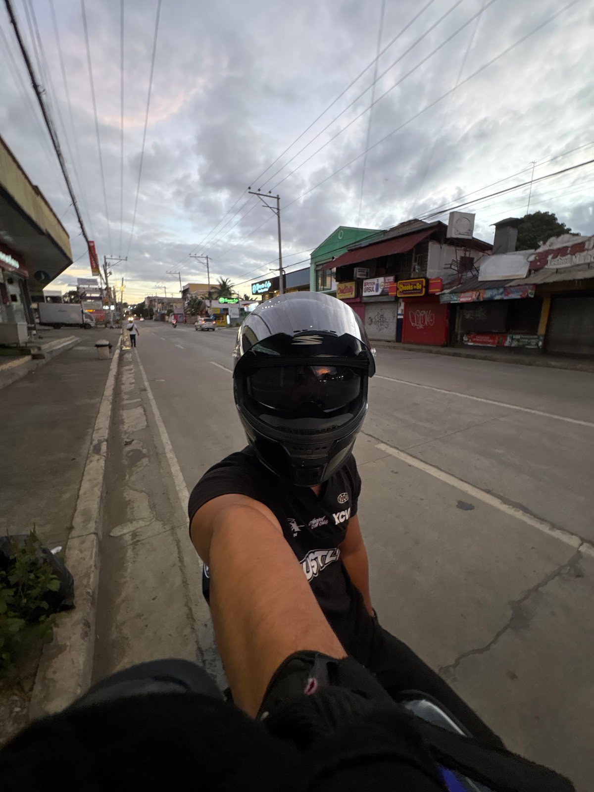 Davao City street traffic at dusk, June 2026