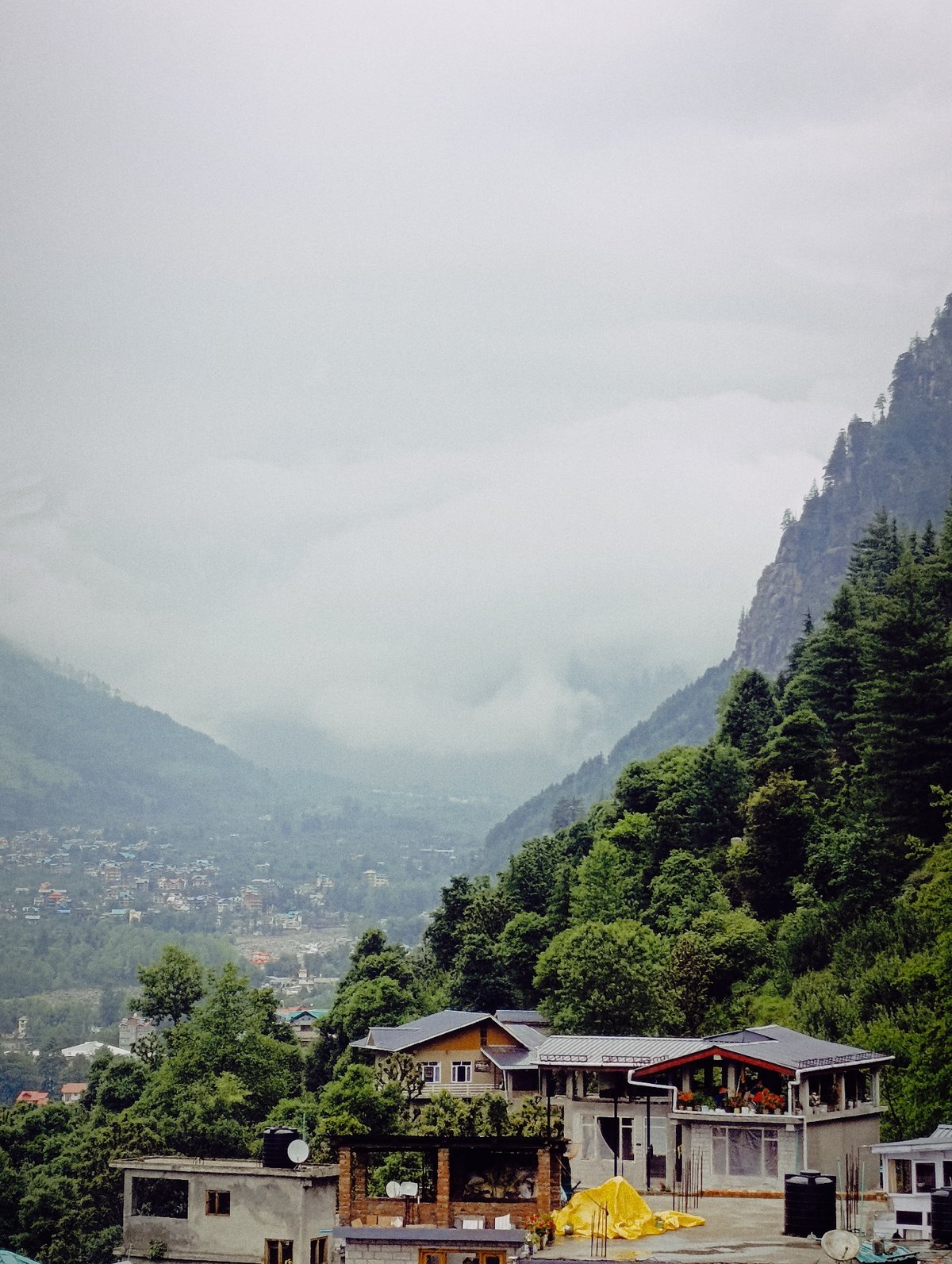 Monsoon clouds blanket Vashisht mountains in northern India