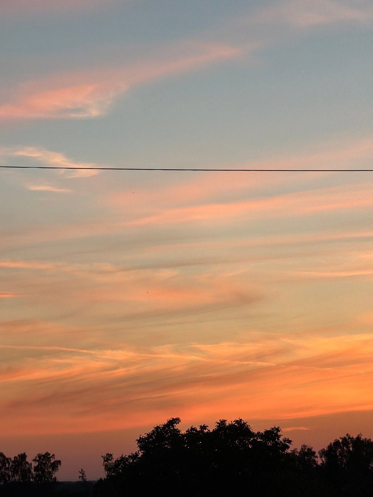 Summer sunset over Gorzów, watched from indoors and out