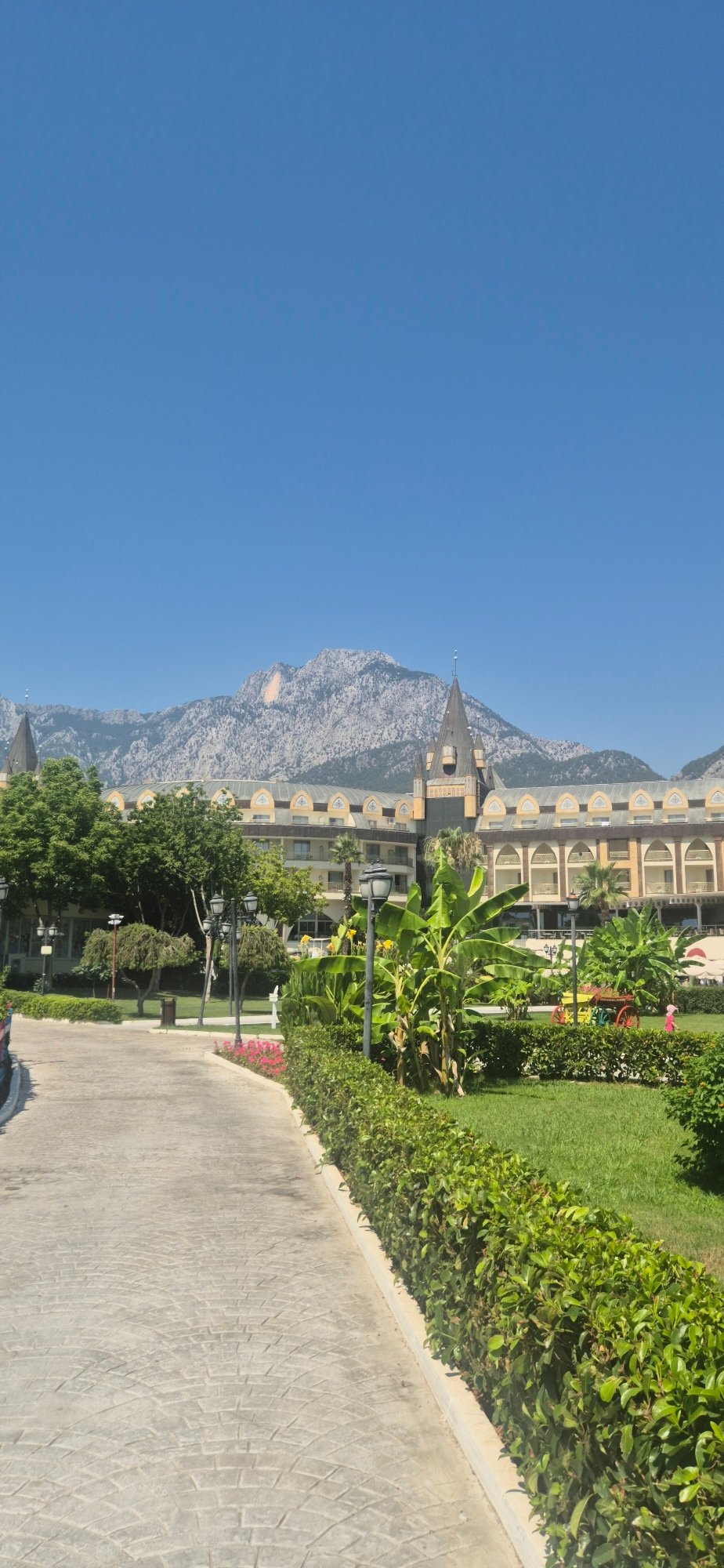 Kemer resort grounds on a sunny summer morning