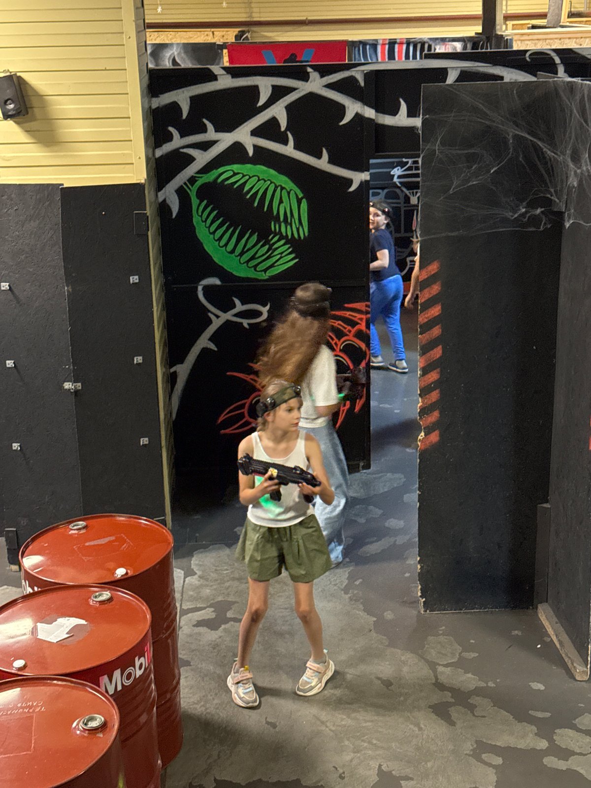 Kids' laser tag session at a Perm indoor arena