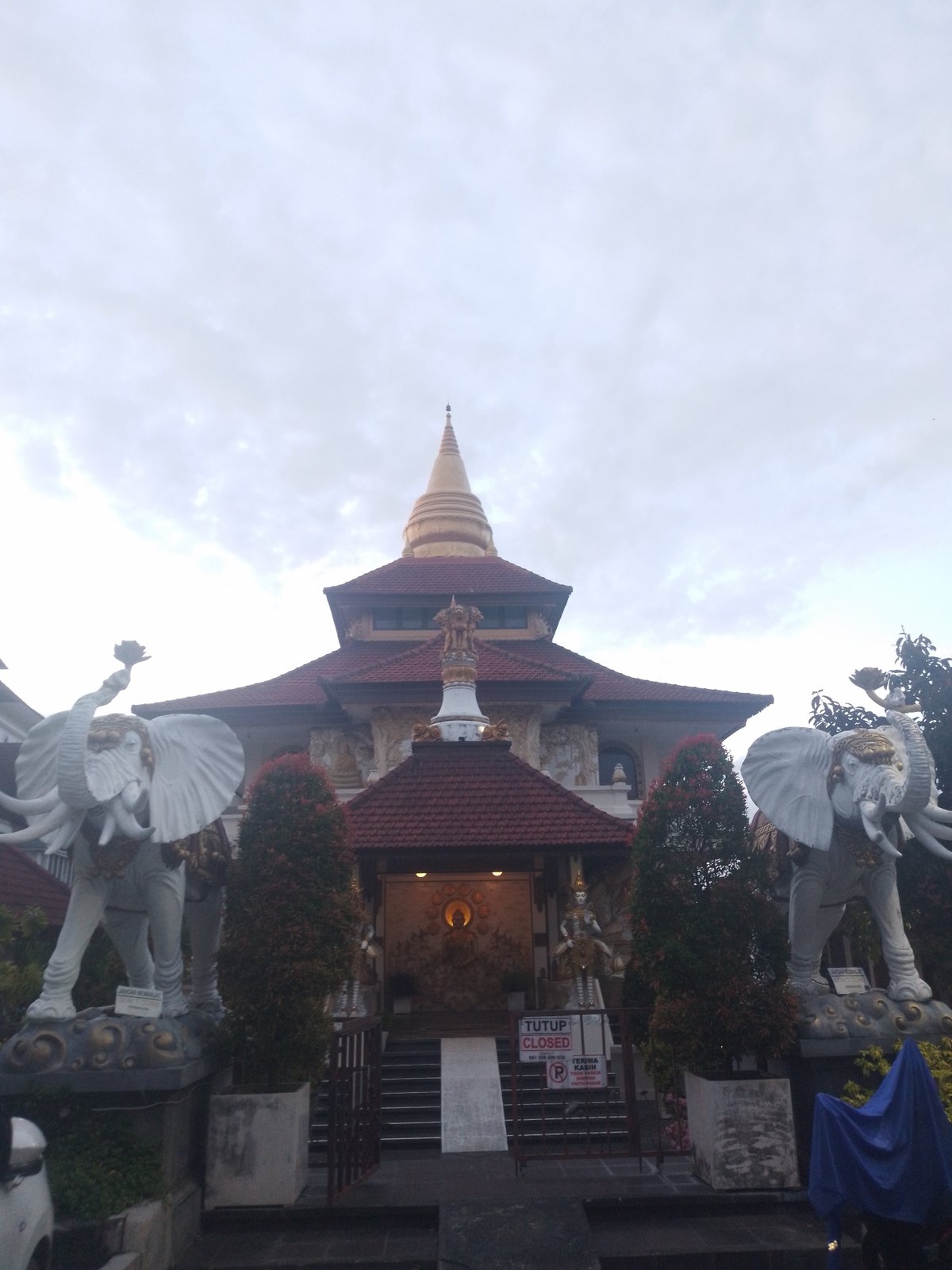 Tourist documents Balinese temples and cultural sites in Kuta Selatan