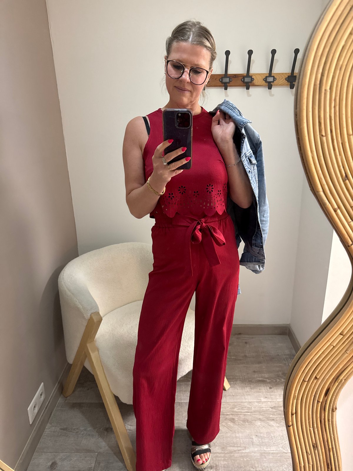 Woman takes mirror selfie in Marche-en-Famenne, Belgium
