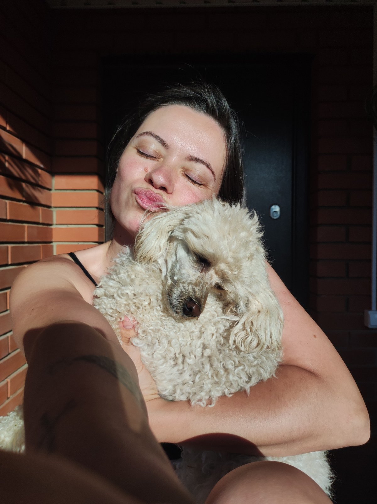 Family moments with woman, white poodle, and baby in Фоки