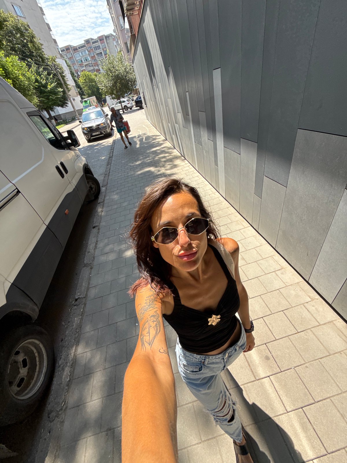 Selfie session around sunny Pleven streets, July morning