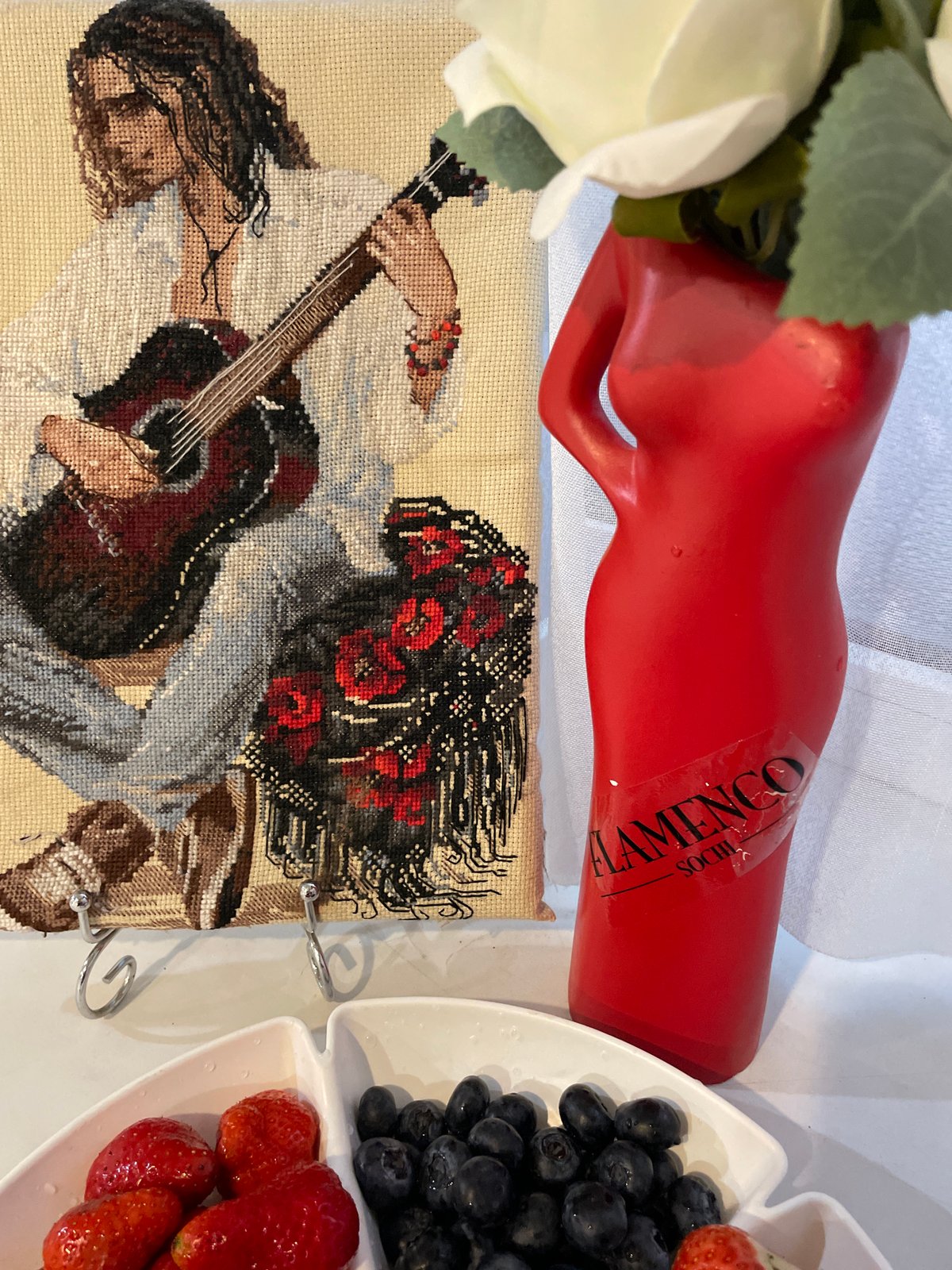 Everyday scenes documented in Sochi: flamenco crafts, fresh berries, local storefront