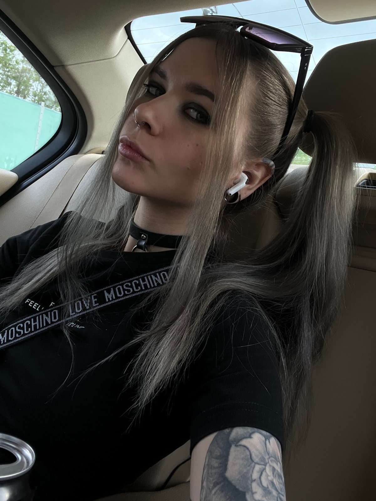 Casual photos captured in Khimki: woman in vehicle, urban buildings