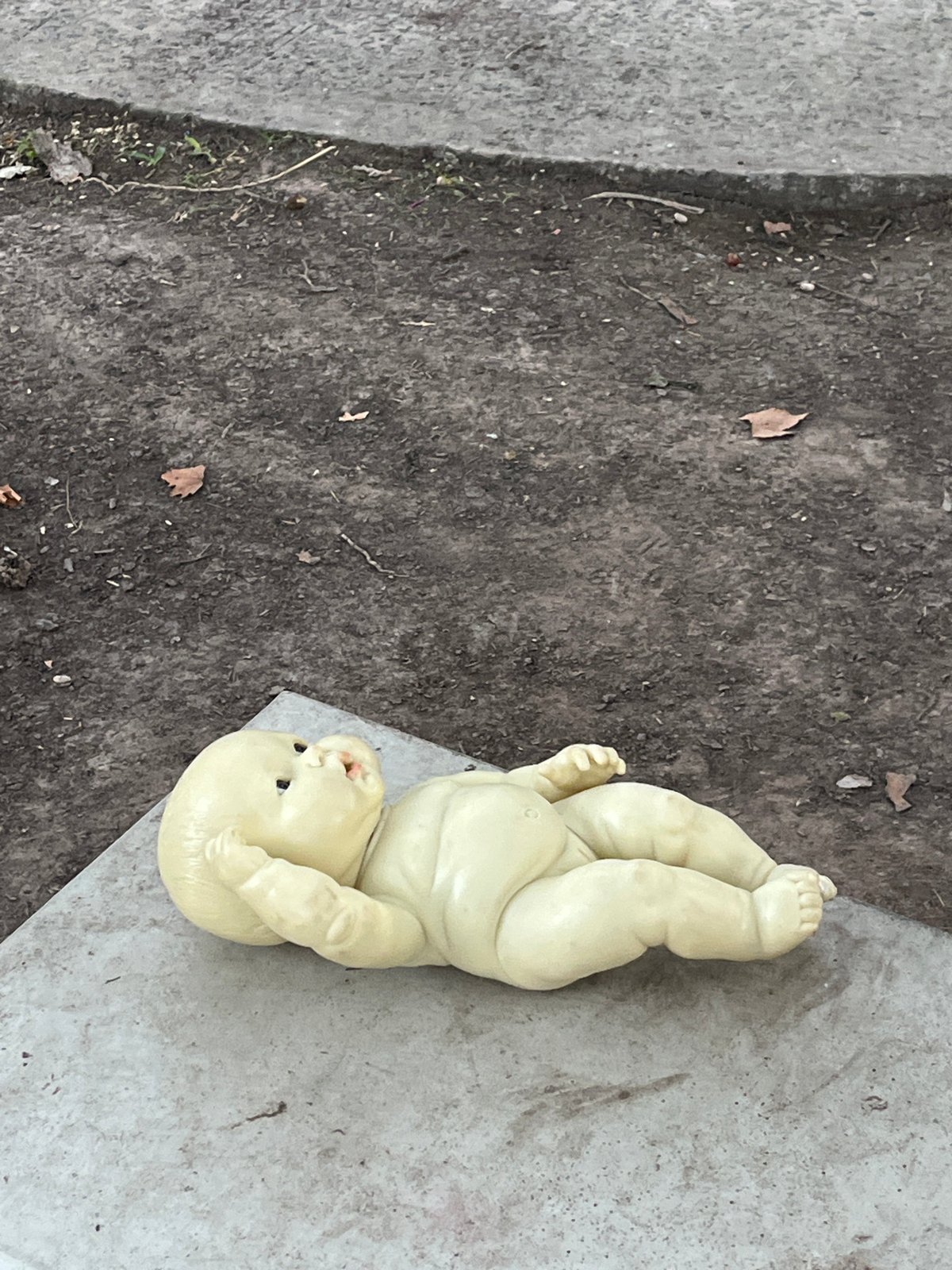 Abandoned baby doll found upside down in Olivos, Argentina