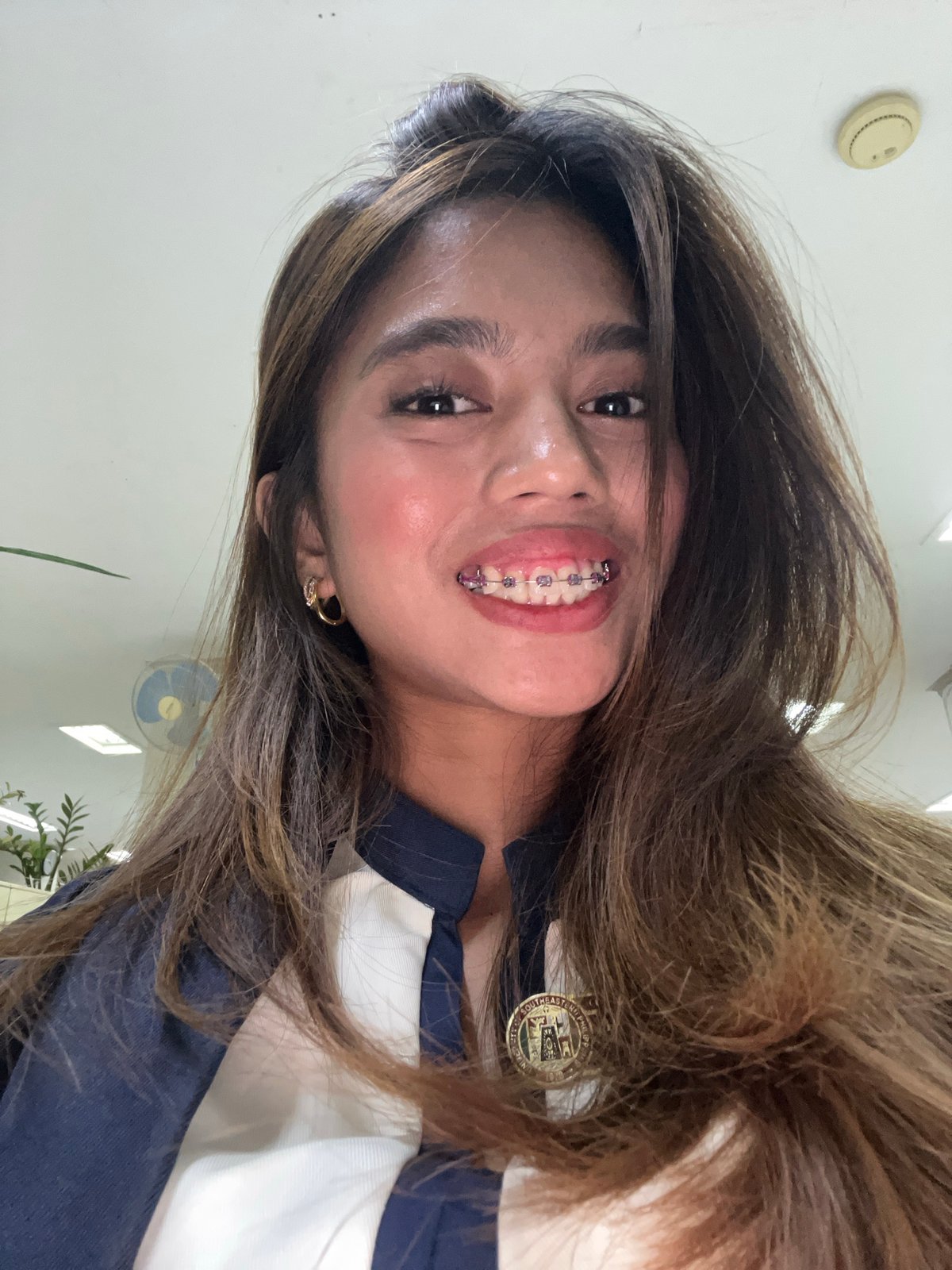 University staff day in Davao — uniforms, elevators, and office life