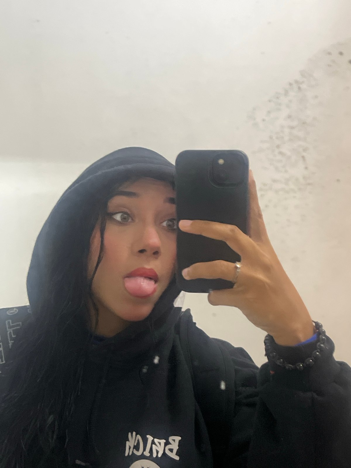 Post-rain street documentation and selfies captured in Pampatar, Venezuela