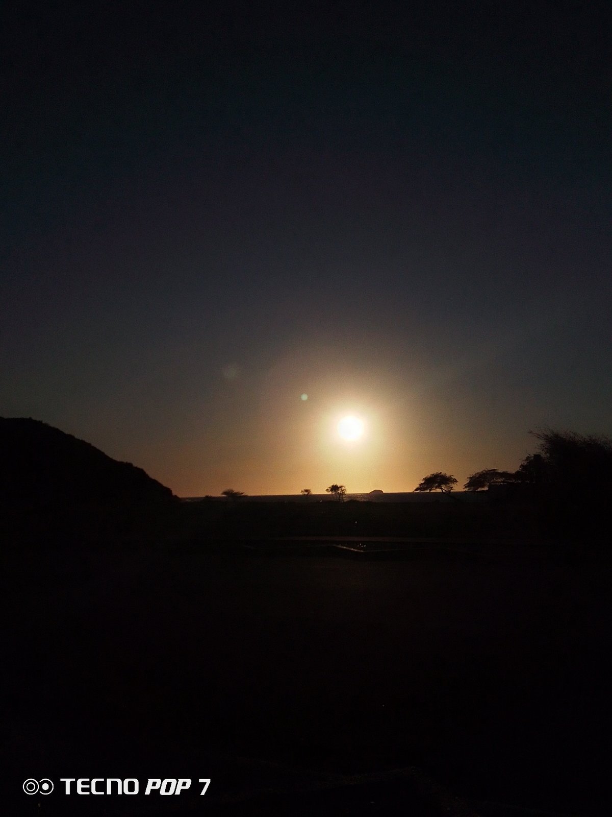 Witness documents sunset sequence over silhouetted mountain landscape