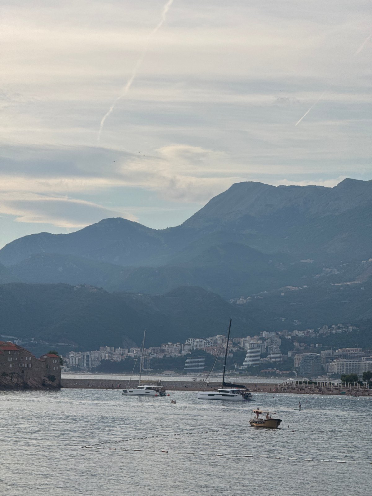Sunset paddleboarding and beach scenes at Sveti Stefan, Montenegro