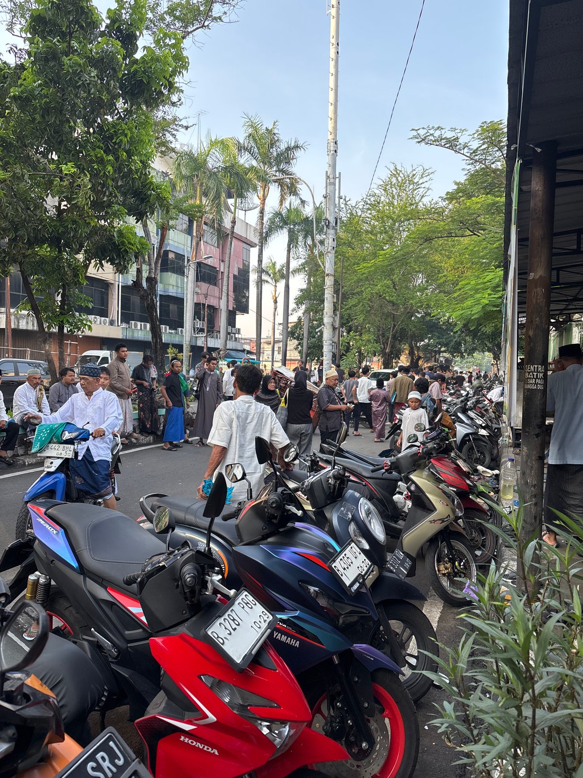 Urban life scenes captured across Central Jakarta morning