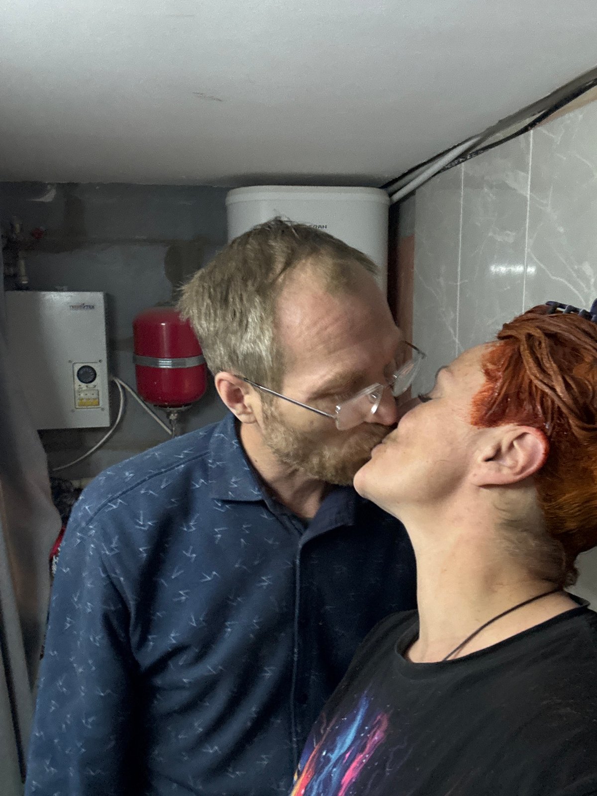Couple shares intimate hair dyeing session in Chaikovsky bathroom