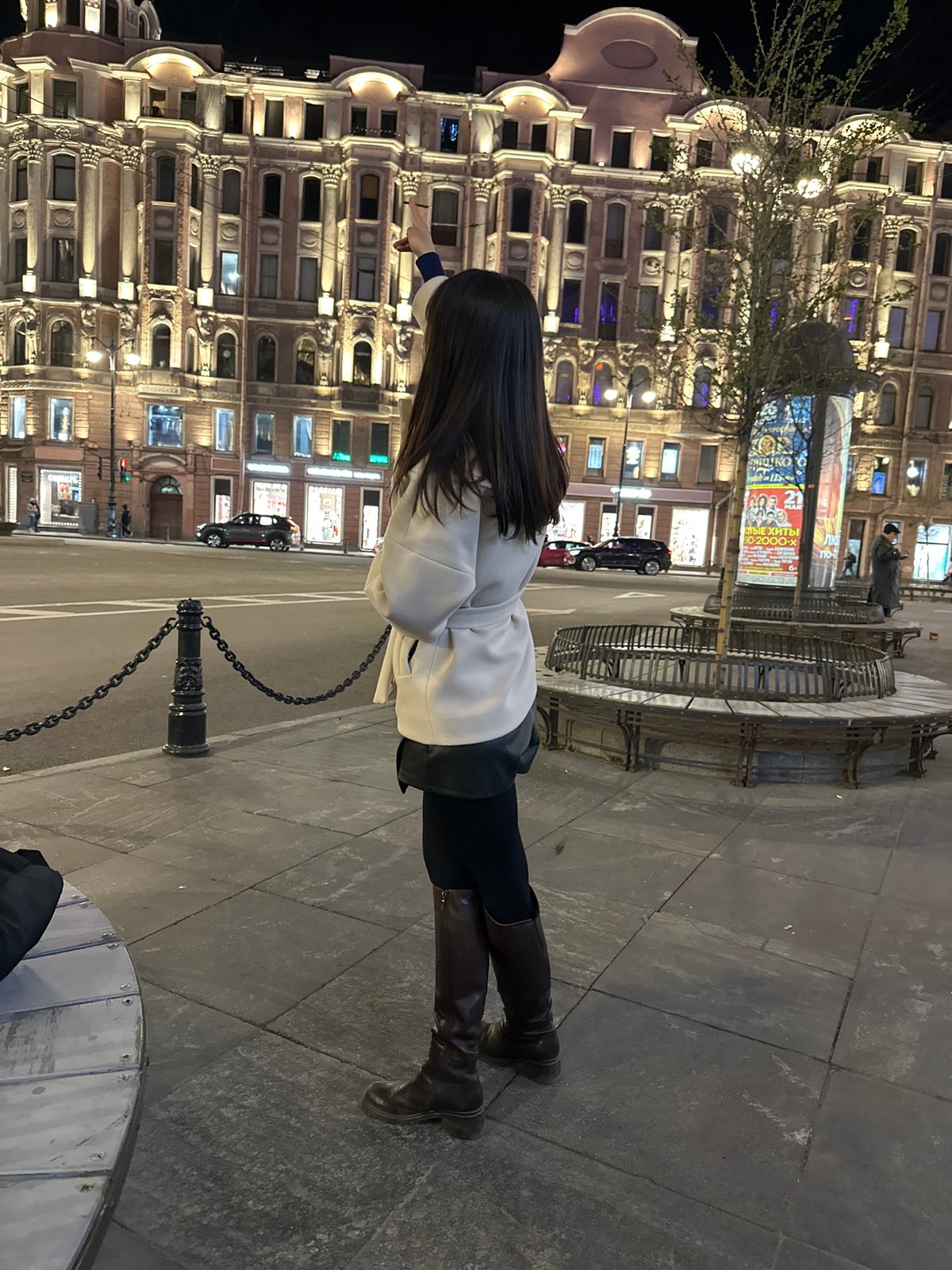 Evening street scenes captured near illuminated buildings in Saint Petersburg