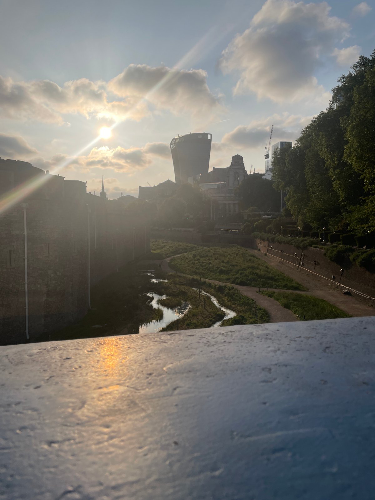 London landmarks observed during evening hours near Tower Bridge