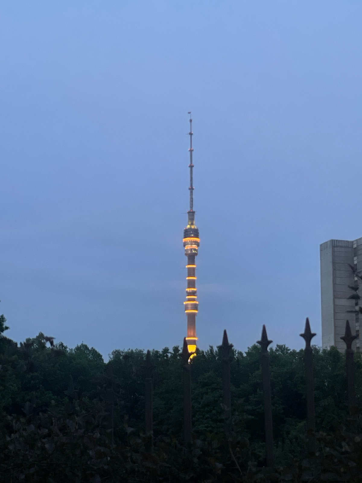 Moscow's Ostankino Tower illuminated at dusk