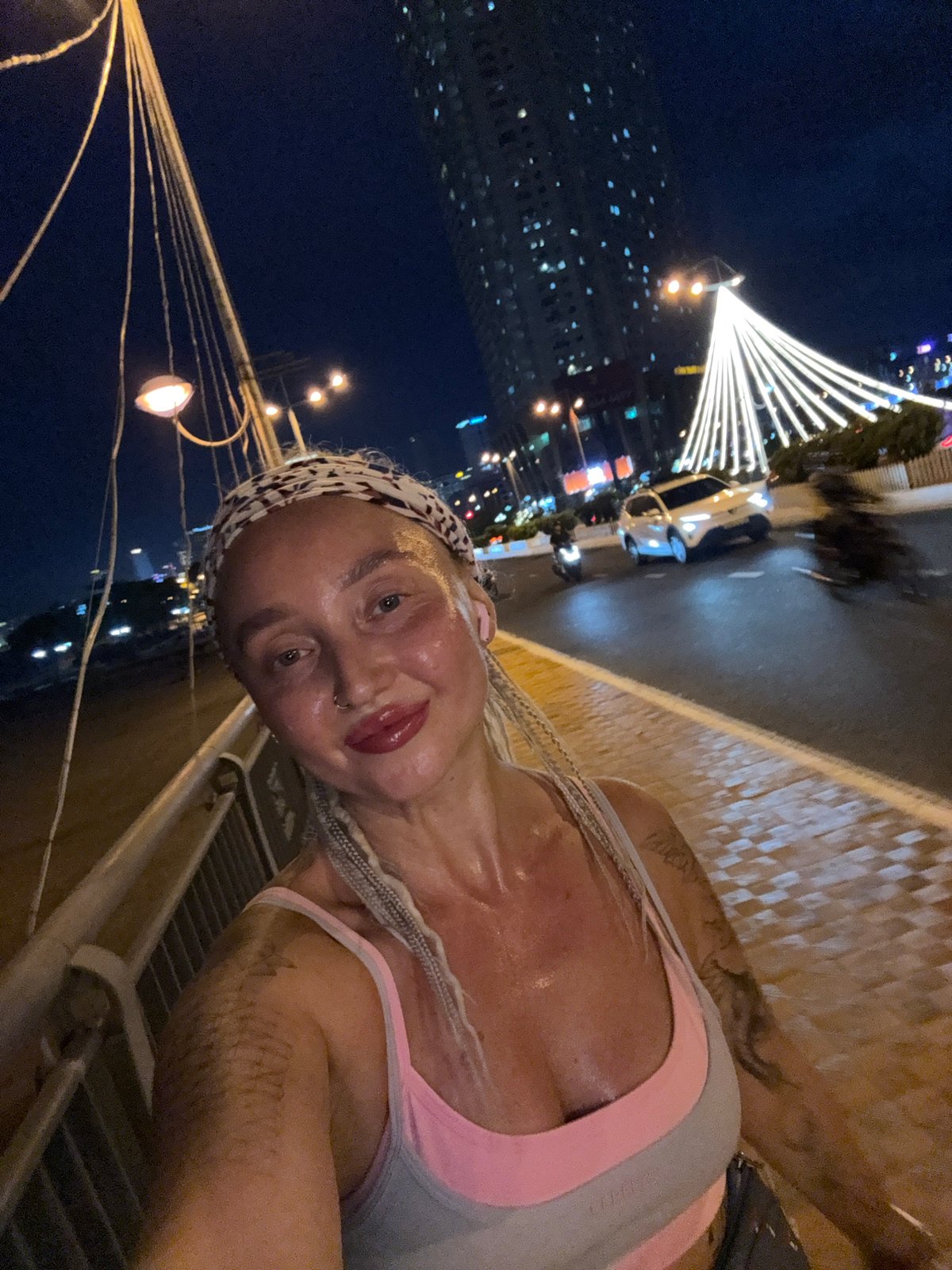 Evening jog through illuminated bridges and waterfront in Nha Trang