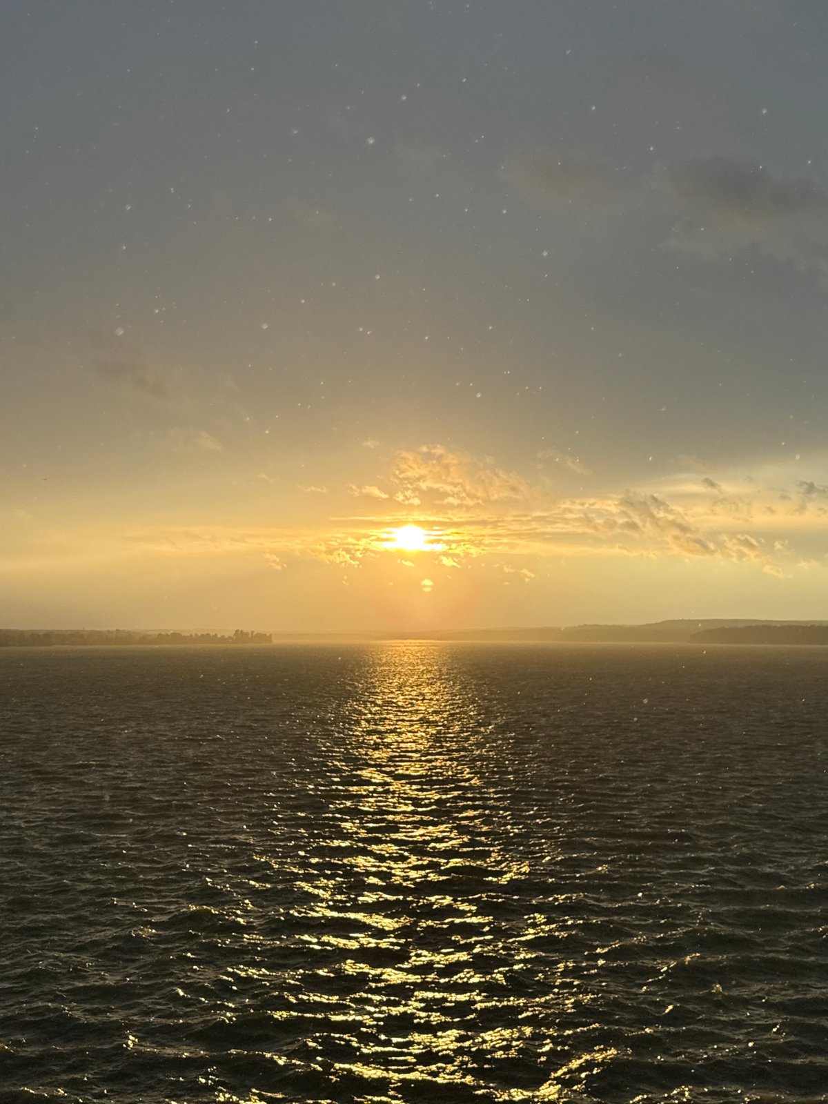 Golden sunset over choppy water near Votkinsk, Russia