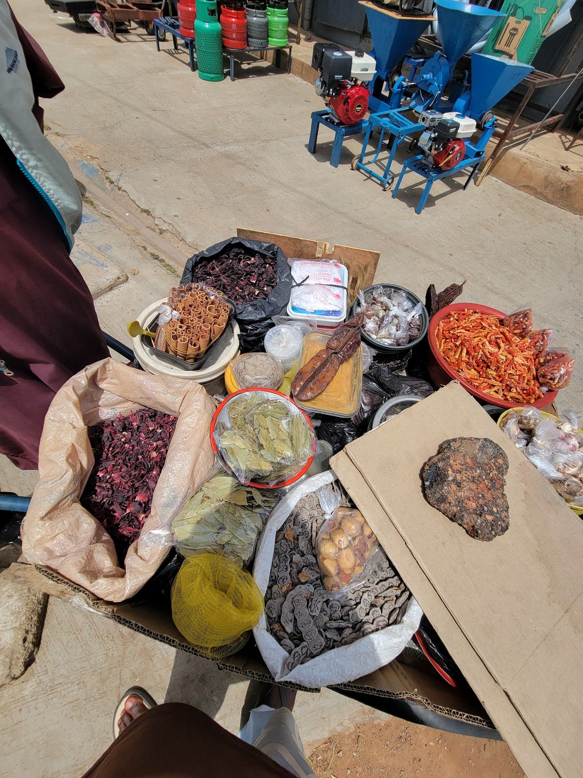 Woman with package spotted near bustling Jos market