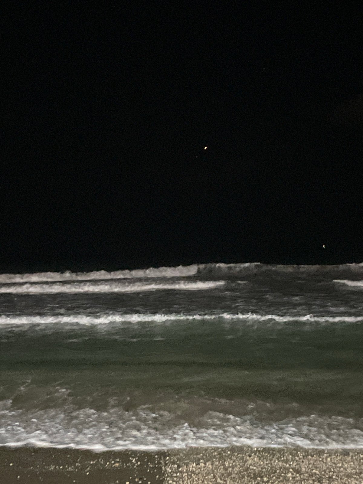 Night at the Herzliya beachfront, waves and promenade