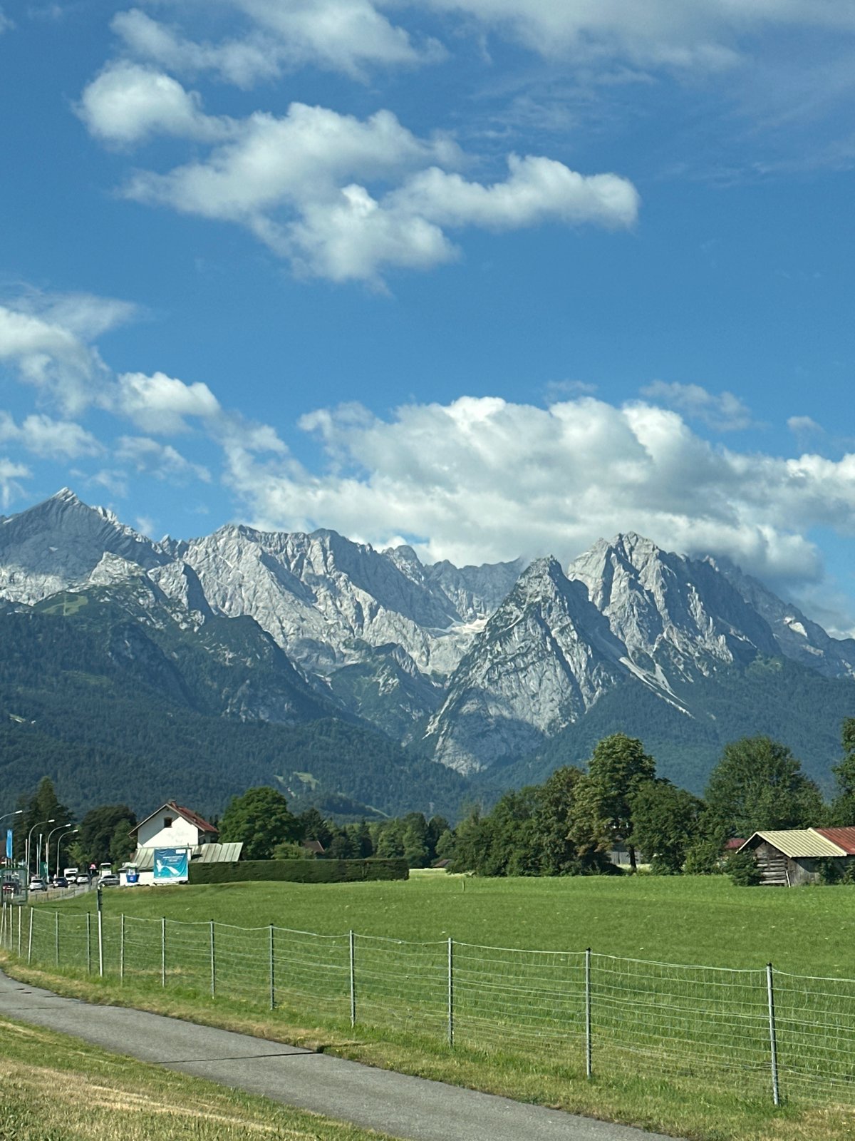 Zugspitze massif rises over Garmisch-Partenkirchen on a summer morning