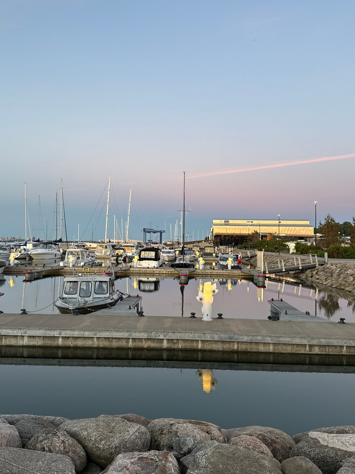 Tallinn's Pirita Marina at golden hour, boats and bar life