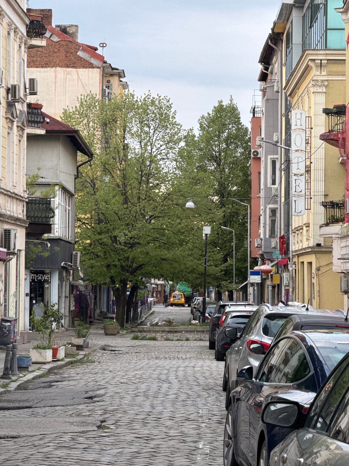 Spring scenes captured on Sofia streets amid overcast afternoon