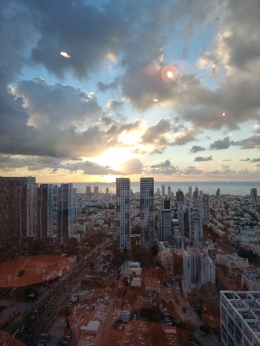 Sunset views of Tel Aviv skyline captured from elevated positions