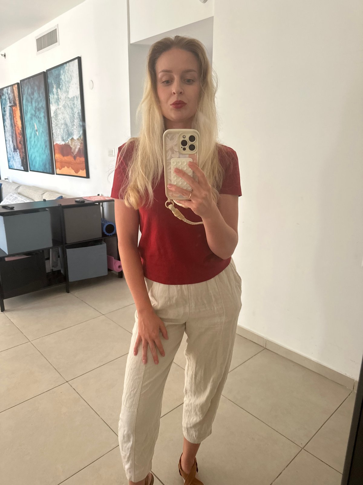 Mirror selfie and hallway shot inside a Petah Tikva apartment