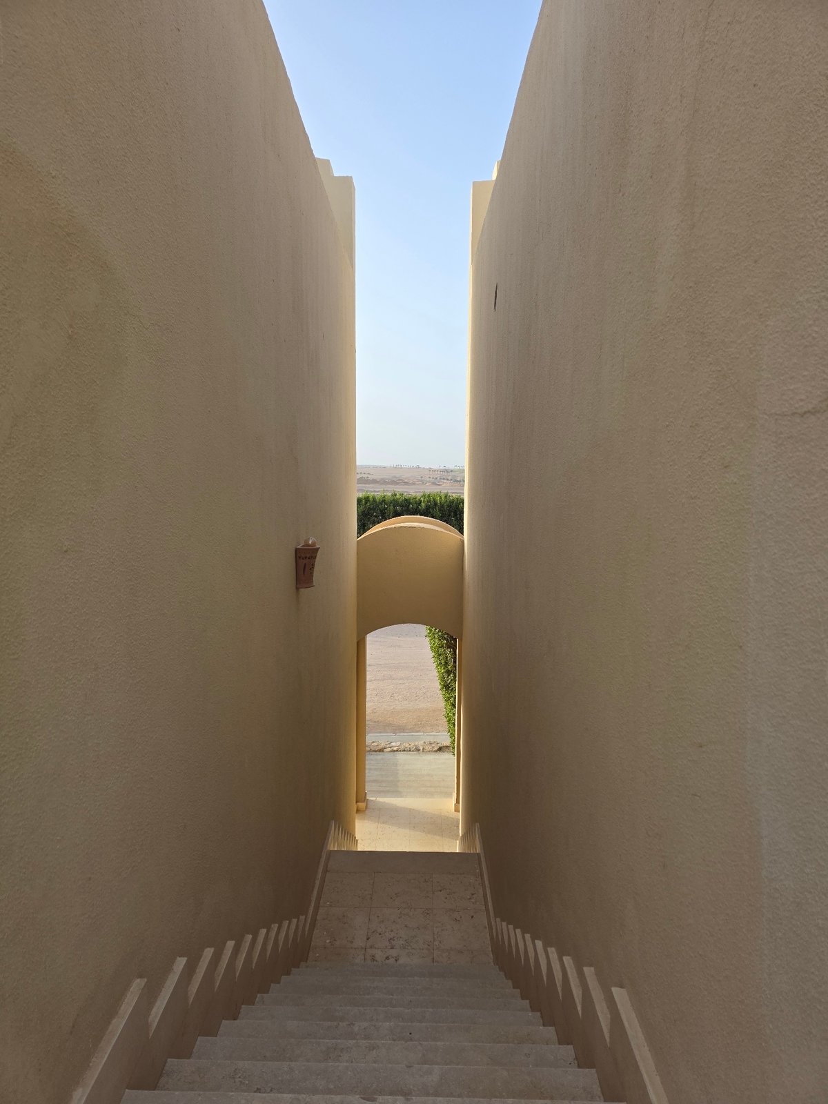 Egyptian archway architecture documented in alley and interior views