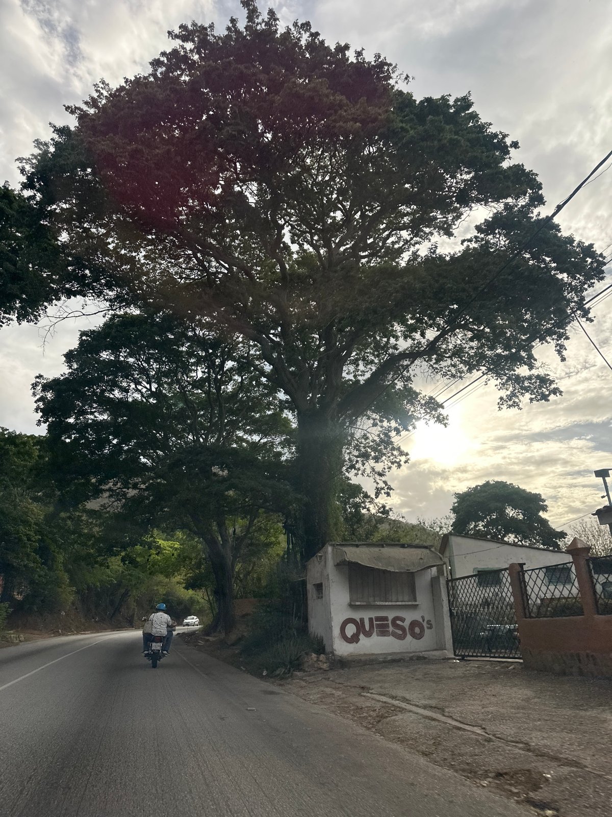 Motorcyclist travels winding roads through La Asuncion, Venezuela