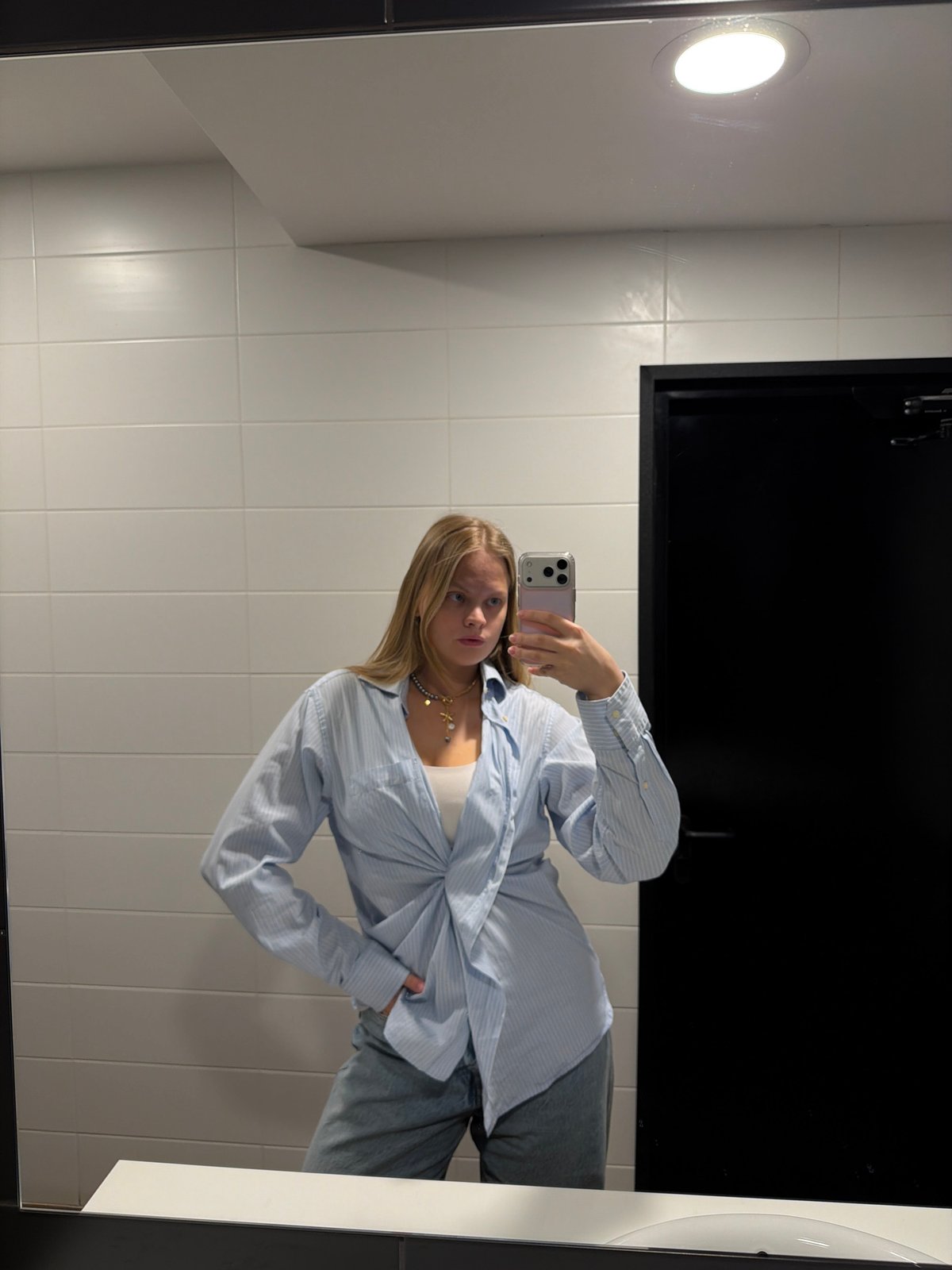 Woman photographed at multiple Izhevsk locations during early morning