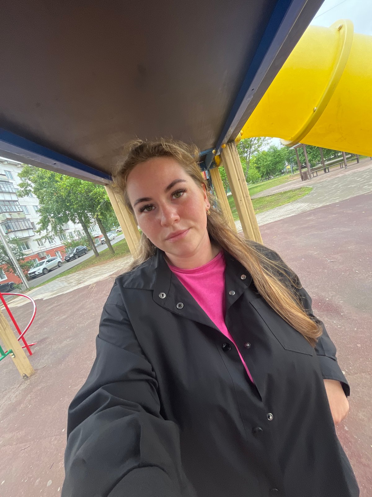 Afternoon at a Chaikovsky park: pigeons, playground, a toddler out