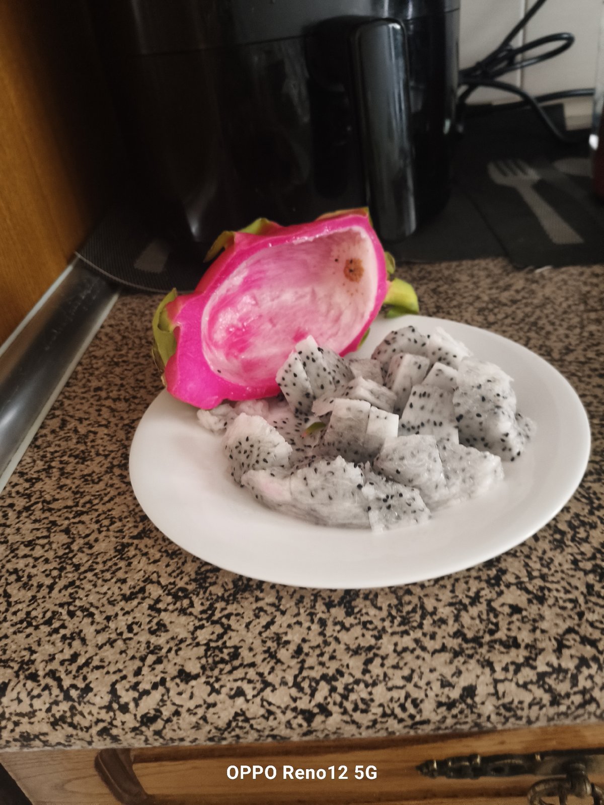 Dragon fruit preparation captured in Cuéllar kitchen