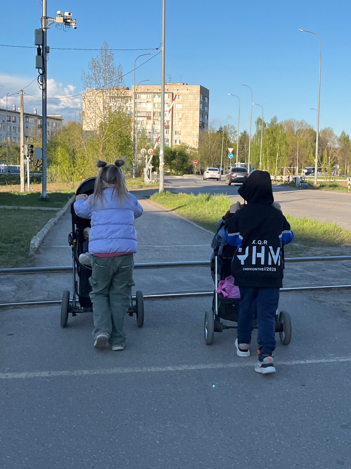 Families document ordinary afternoon activities in Chaikovsky, Russia