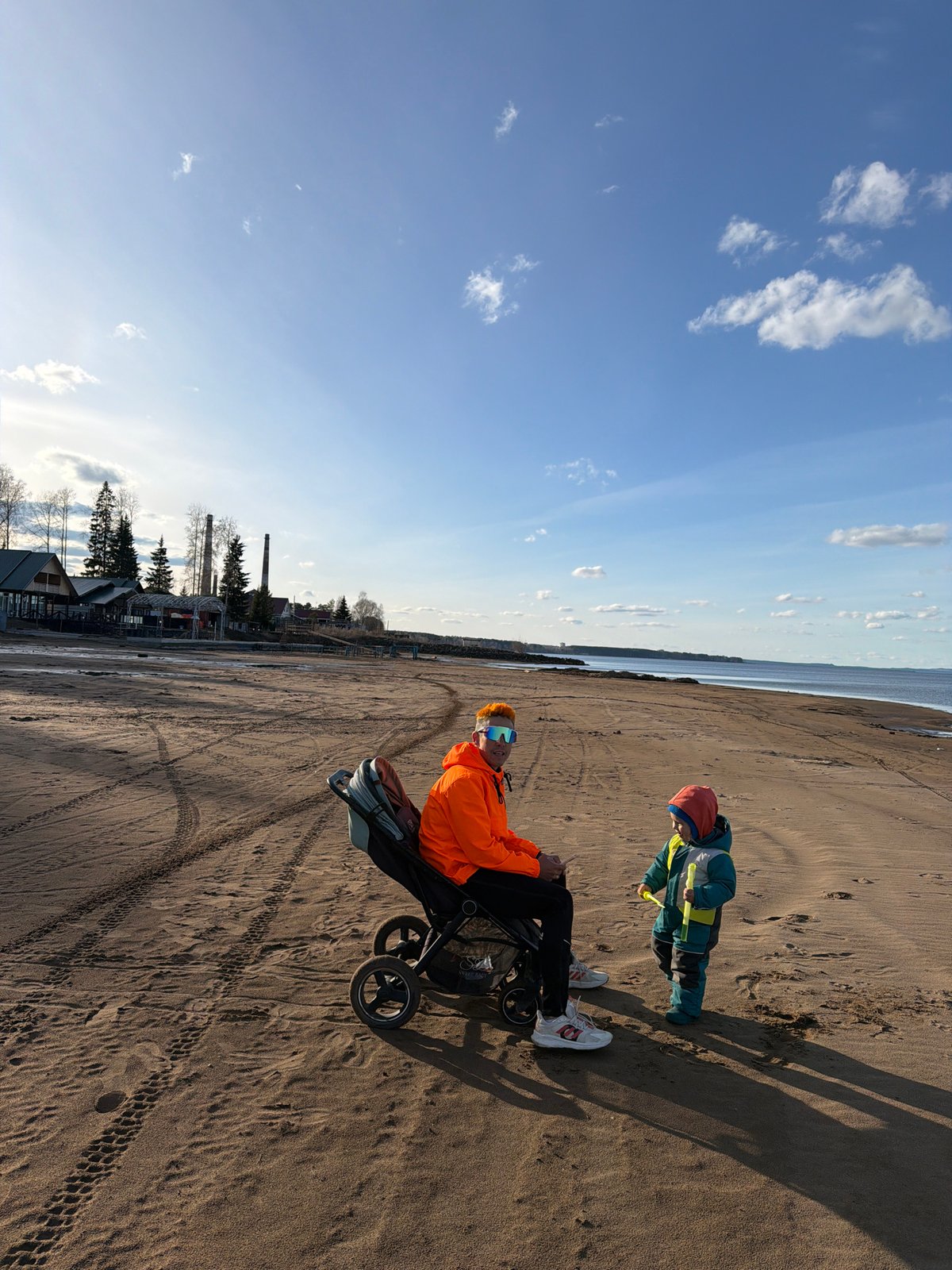 Family enjoys spring beach outing in Chaikovsky, Russia