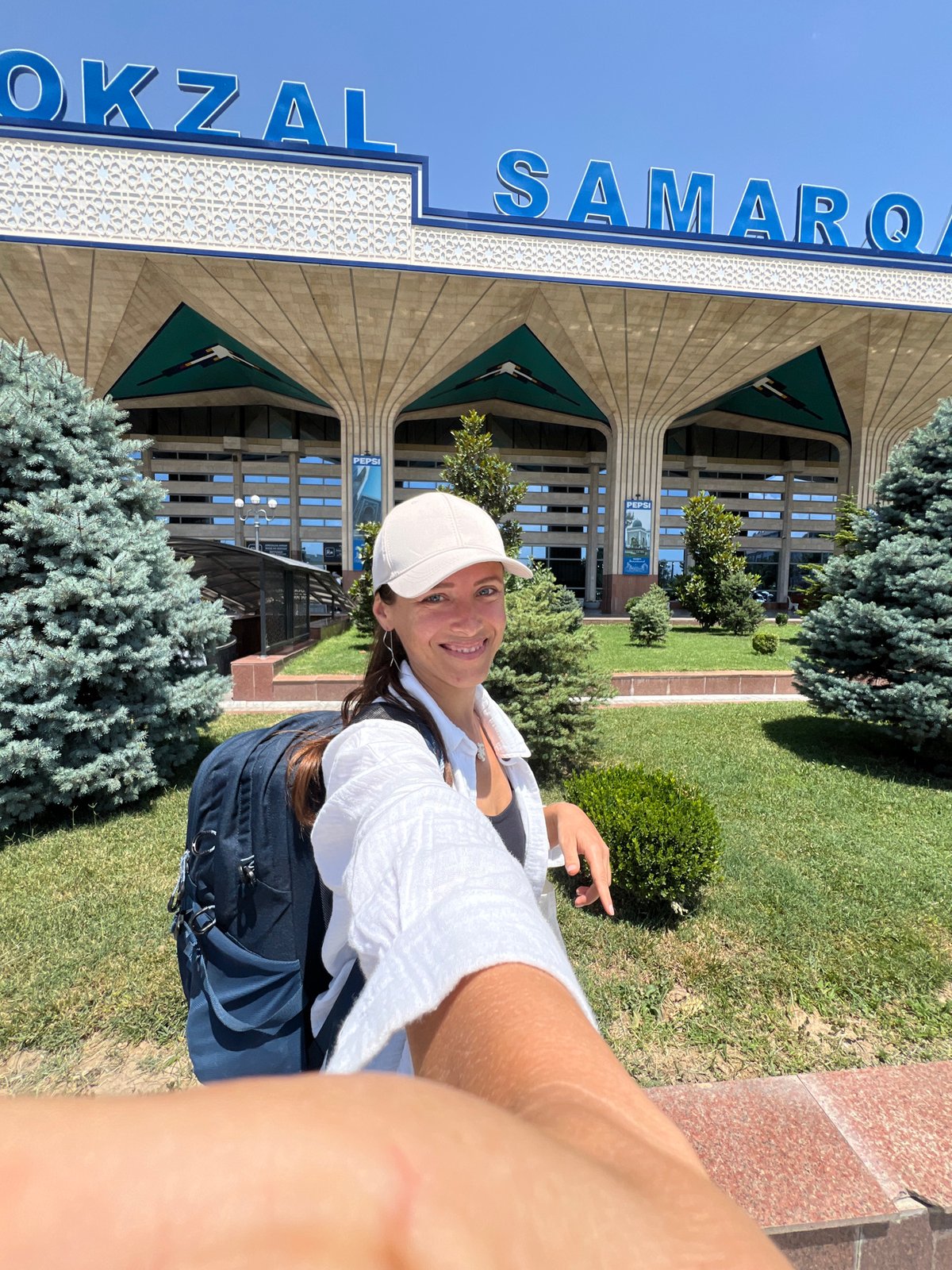 At Samarkand's station and airport on a clear summer morning