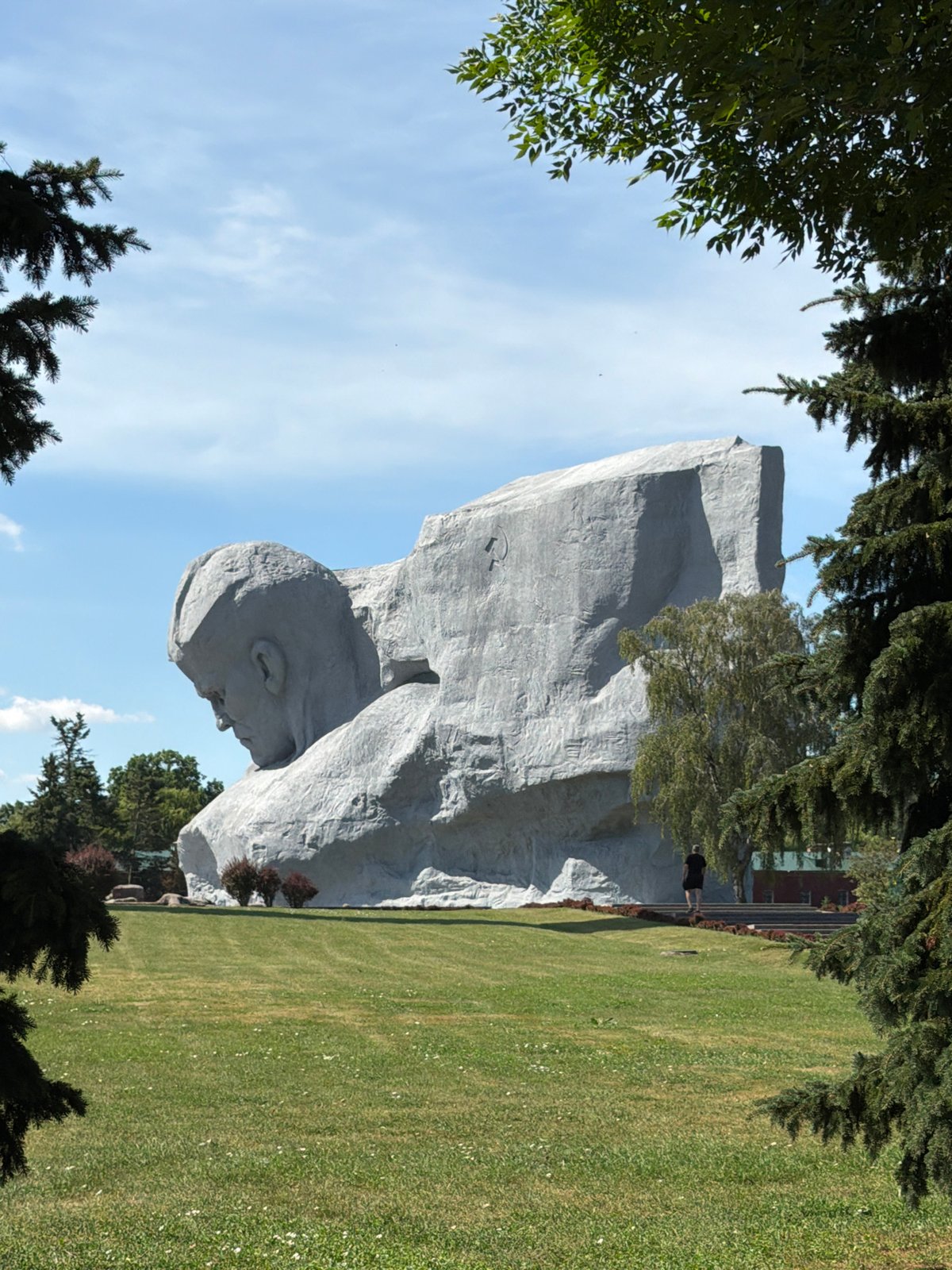 Monuments, obelisks, and a formation walk at a memorial site