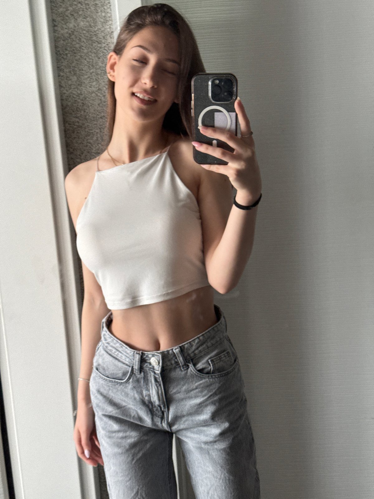 Woman takes multiple mirror selfies during morning session in Sofia