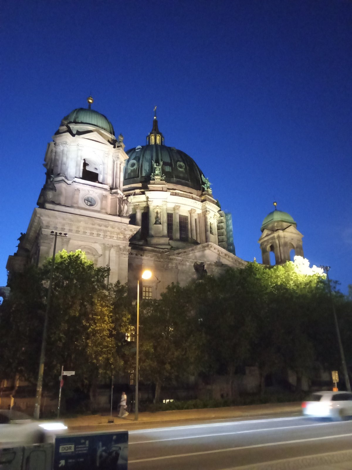 Berlin landmarks illuminated during evening hours on May 23