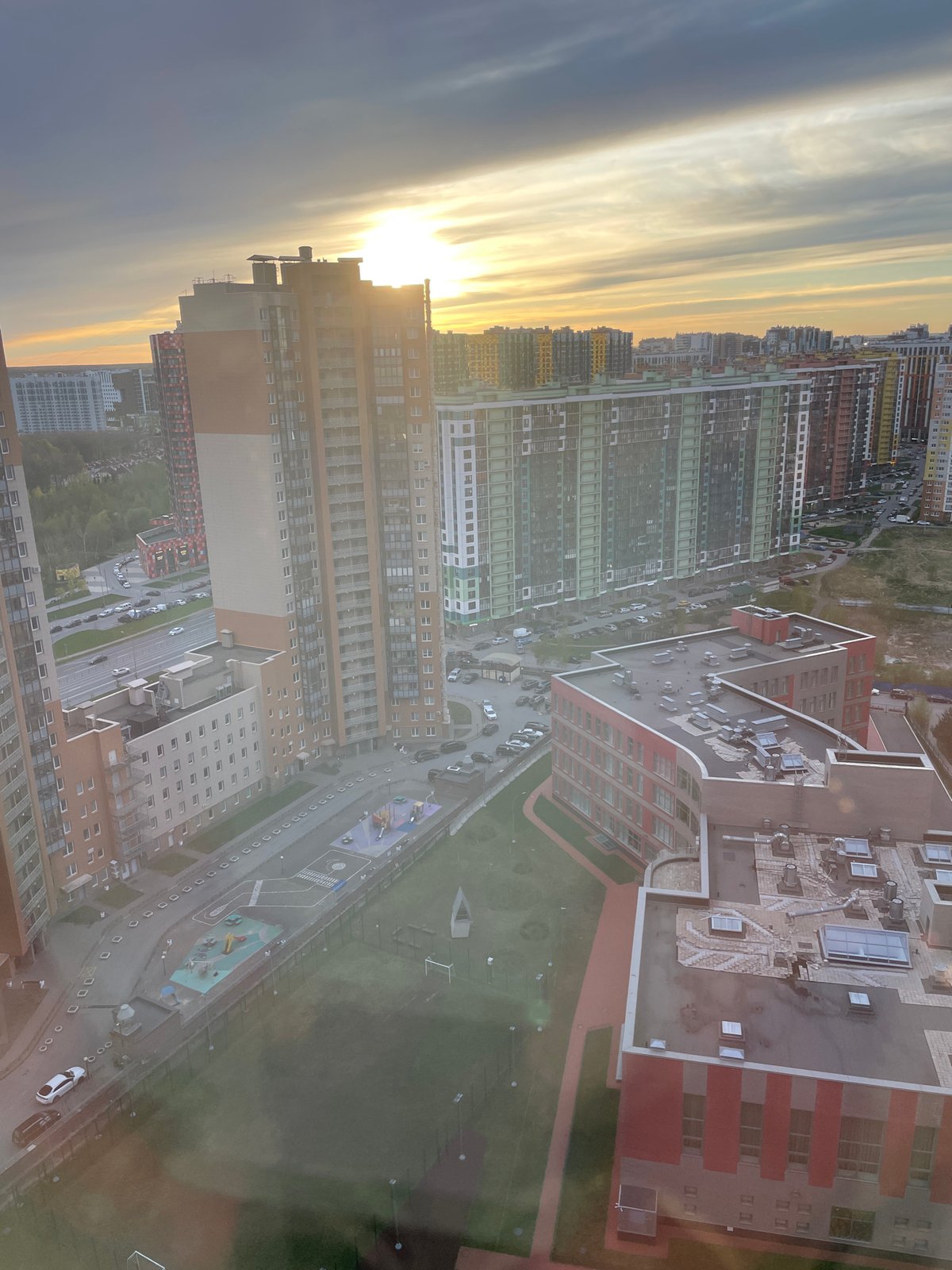 Saint Petersburg resident captures sunset cityscape, indoor cats during evening