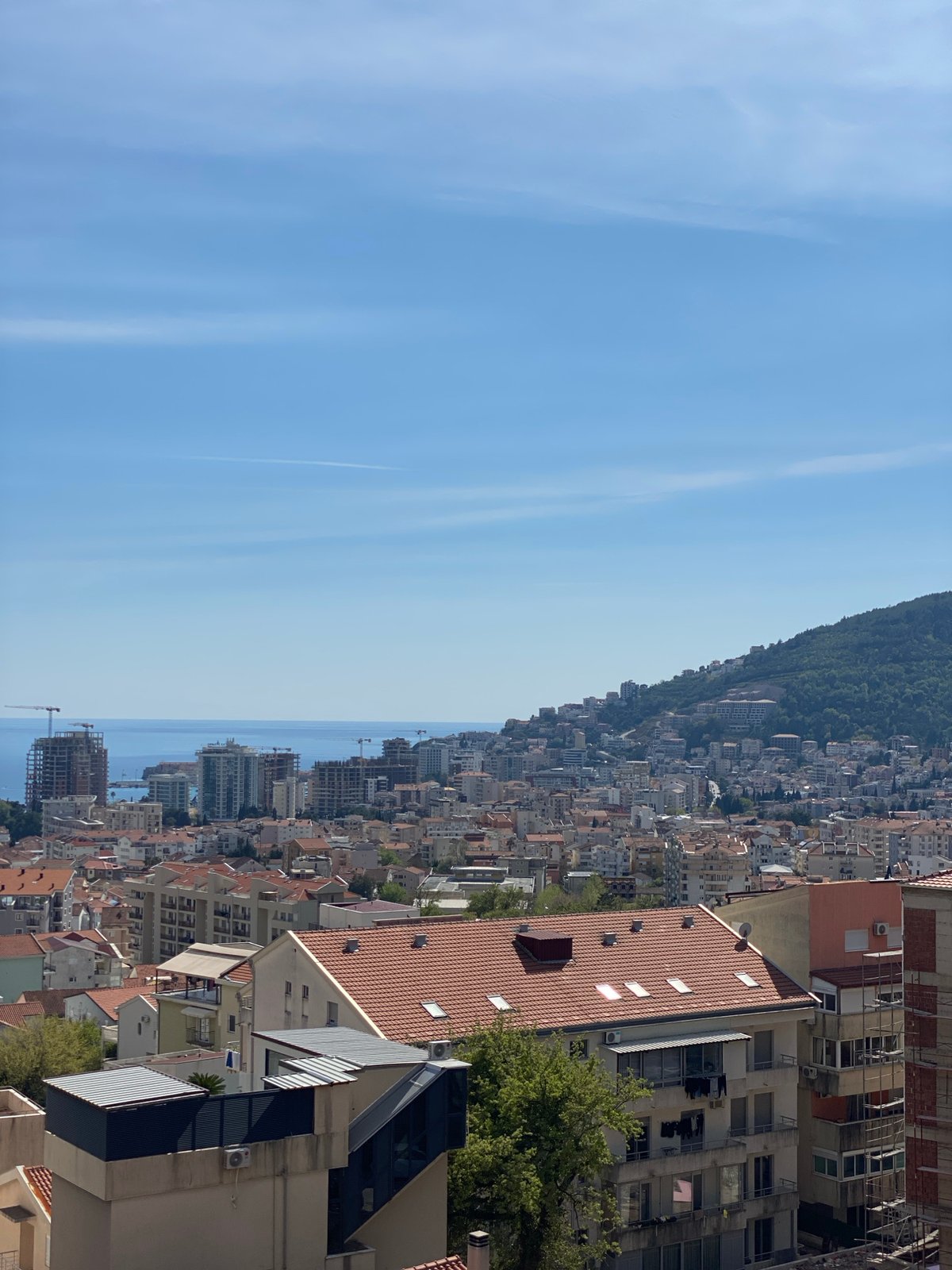 Daytime observations document Budva cityscape and coastal views