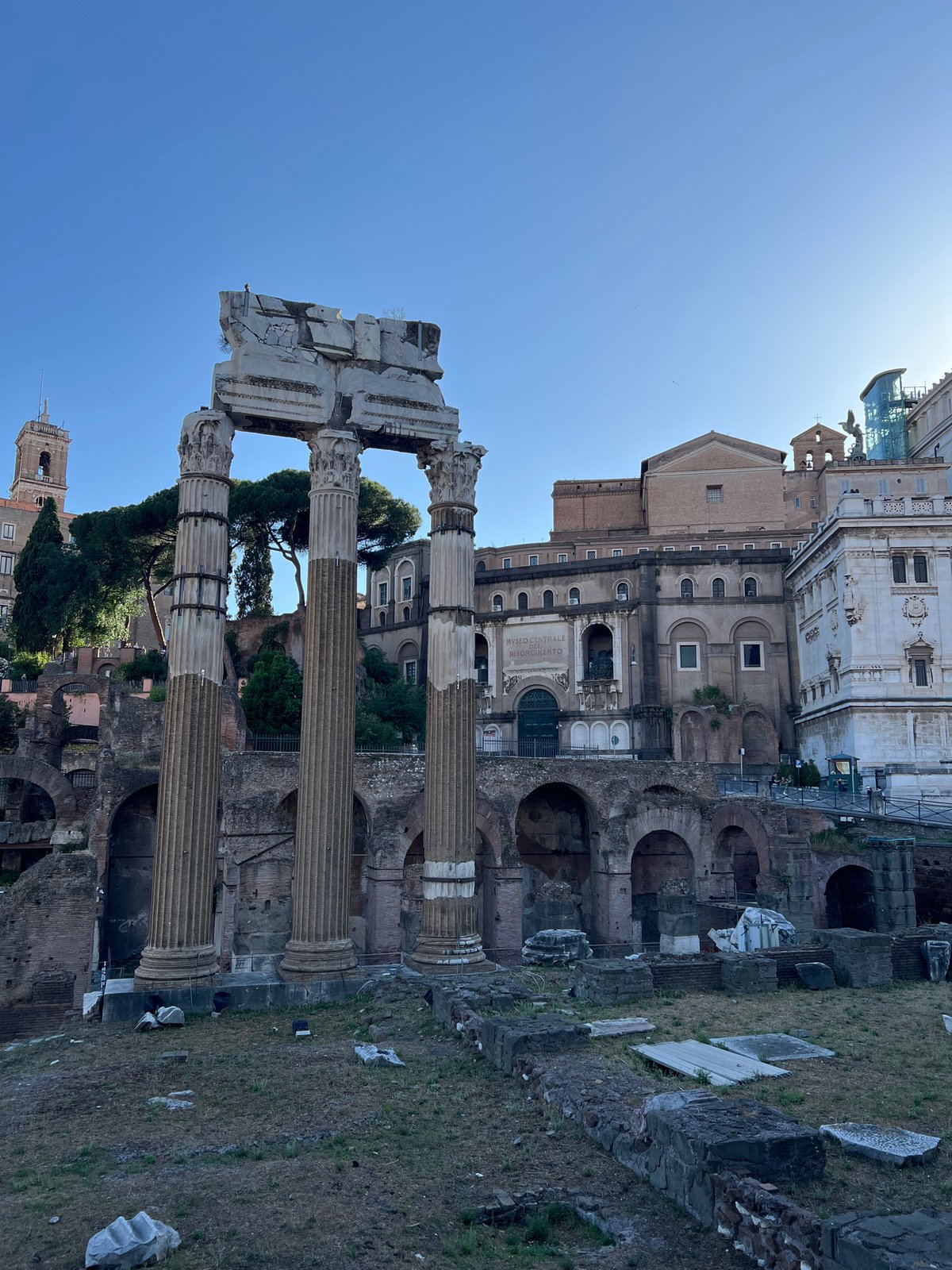 Tourist documents sunny afternoon tour of Roman Forum ruins