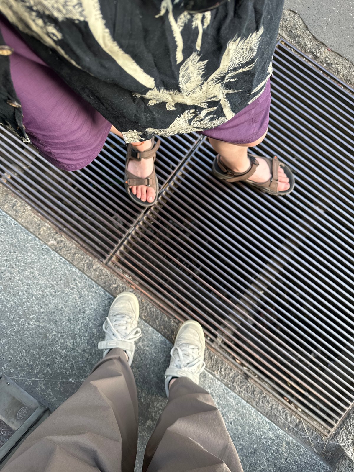 Two people photographed from different angles in Milan