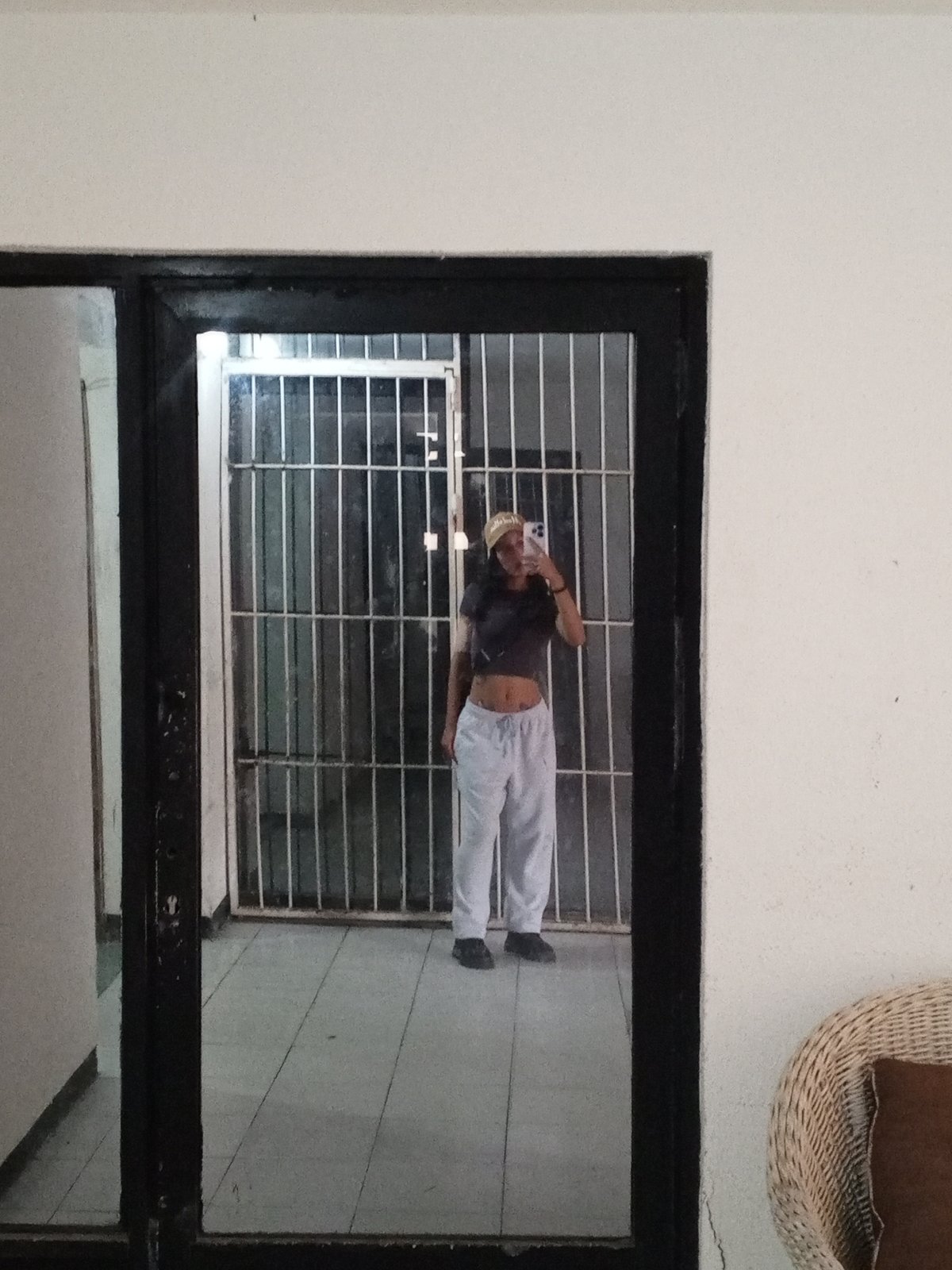Woman takes multiple selfies during photo session in Porlamar