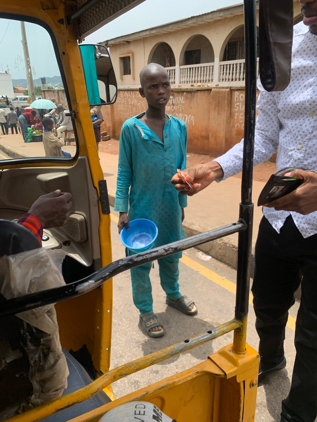 Everyday scenes from a Jos morning, indoors and out